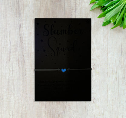 Slumber Squad Glow-in-the-Dark Bracelet – Sleepover Party Favor Bracelet attached to a keepsake card